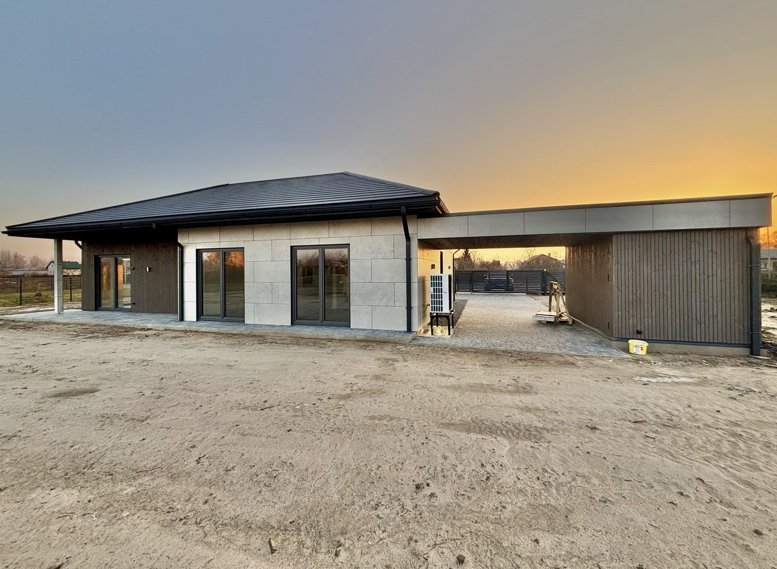 Custom house with carport — At sunset